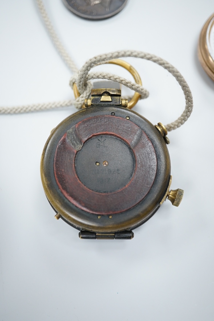 A cased WWI compass, an RG watch and a medal awarded to 33486 PTE. N. FRANCE. LING. R.